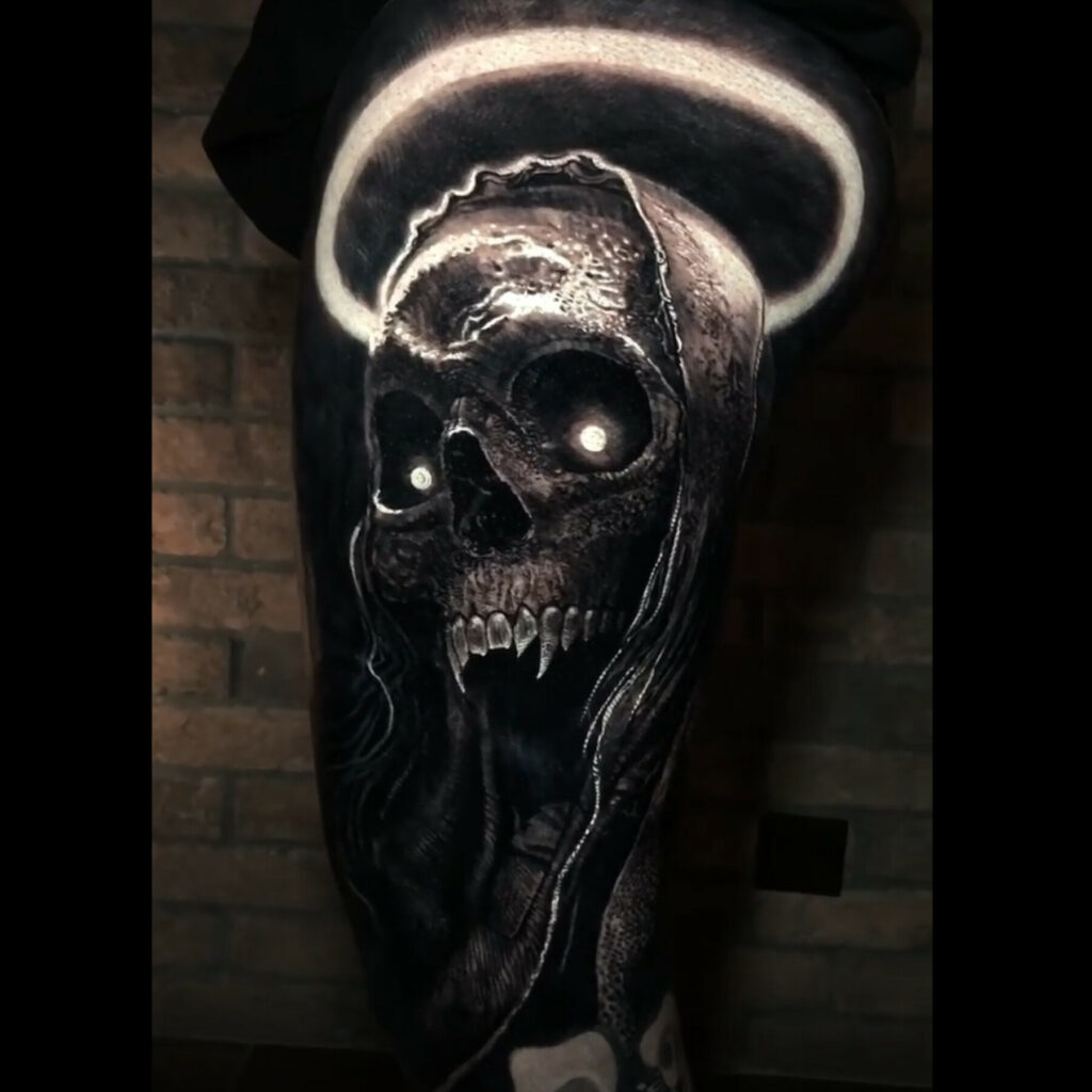 Eliot kohek skull tattoo