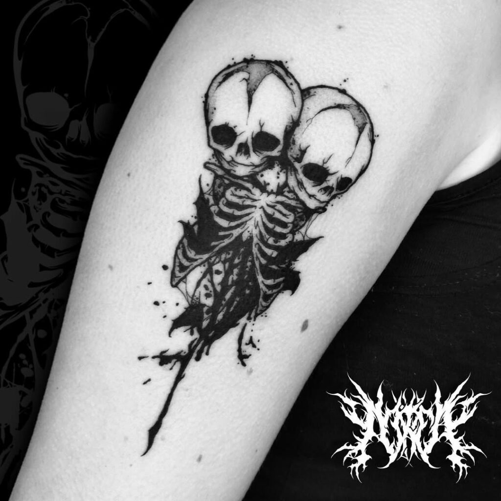 Siamese skulls Adriel tattoo
