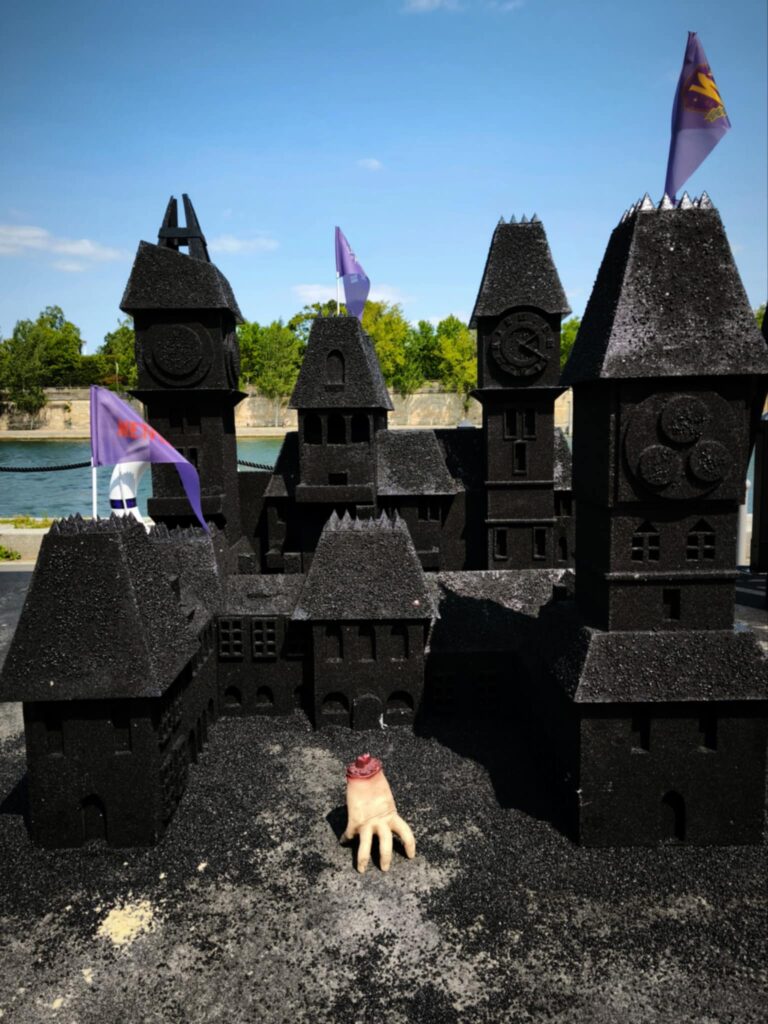 The Thing sand castle wednesday addams beach paris 